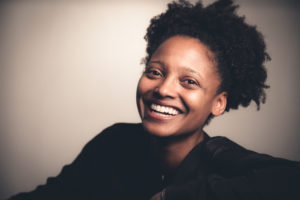 tracy k smith smiling in black sweater