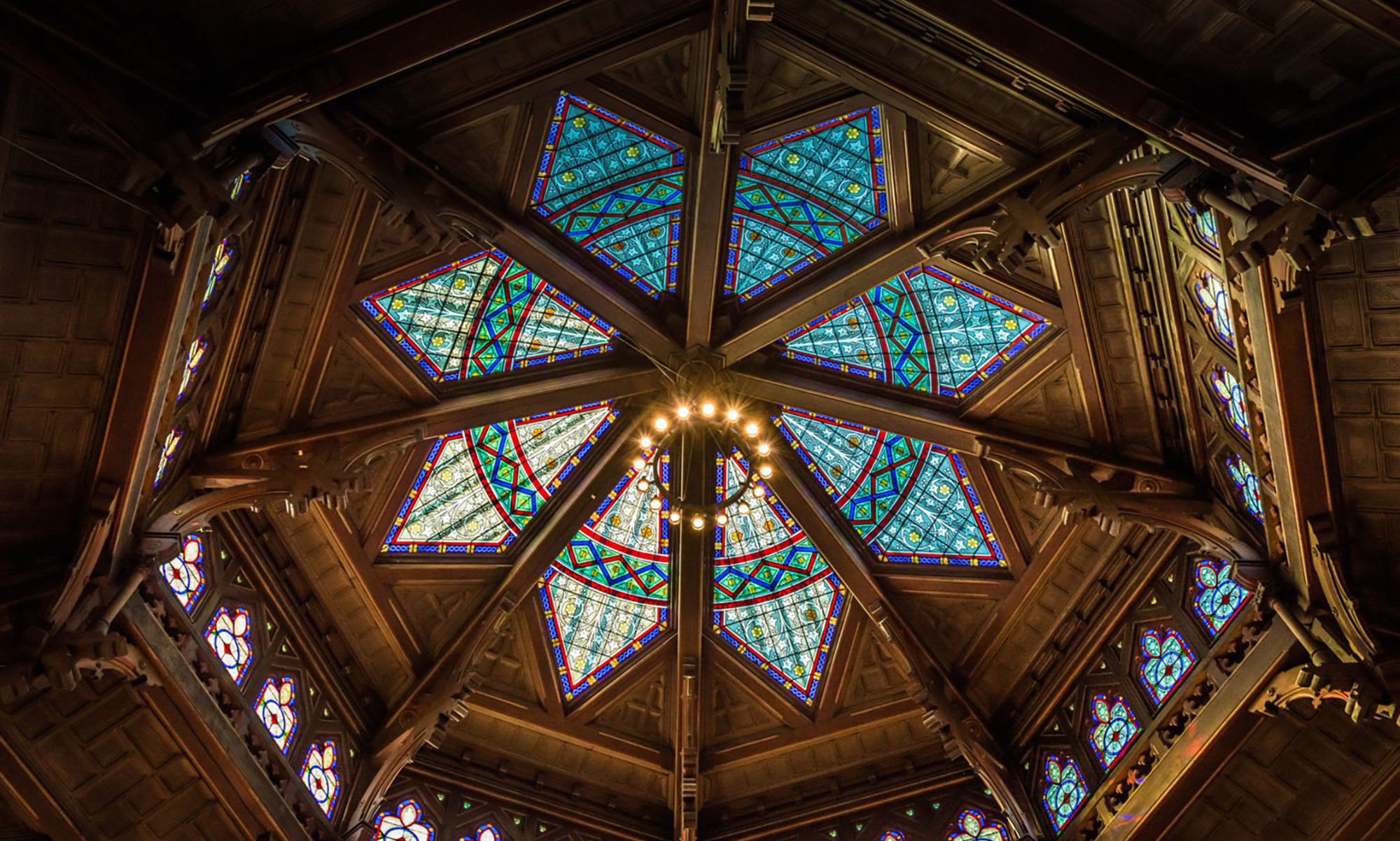 Star-shaped stained glass ceiling of chancellor green rotunda on the Princeton campus.