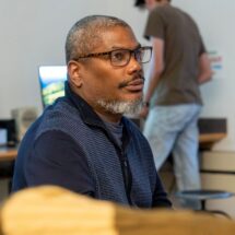 Portrait of Christopher Harris in a classroom setting